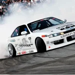 Atraksi Sebuah Mobil Dalam Melakukan Drifting